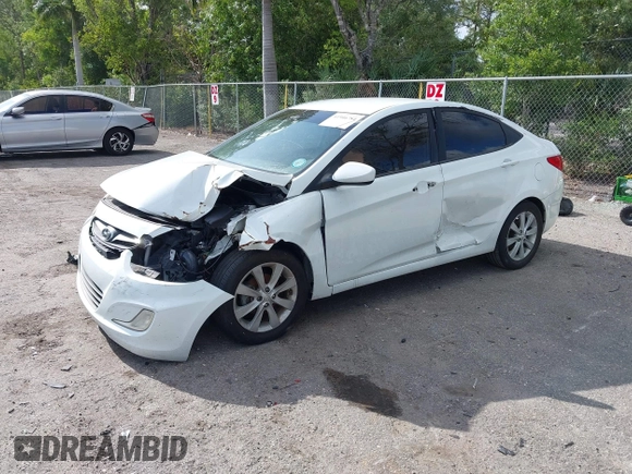 2014 Hyundai Accent GLS with VIN KMHCU4AE8EU608539, listed as a IAAI auction lot 41946784 with 106,709 mi miles and . Bid and sale history available at carsss.com. Image 2.
