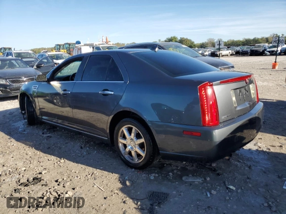 2009 Cadillac STS RWD z VIN 1G6DW67V390104597, wystawiony jako Copart lot #73794724 z przebiegiem Nie podano mil oraz Szkoda całkowita • Salvage title. Historia ofert i sprzedaży dostępna na DreamBid. Obrazek 2.