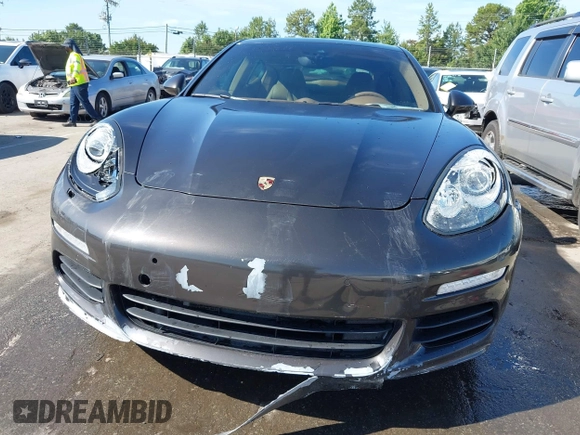 2014 Porsche Panamera S E-Hybrid with VIN WP0AD2A76EL044591, listed as a IAAI auction lot 42436817 with 89,009 mi miles and . Bid and sale history available at DreamBid. Image 6.