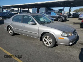 2001 Nissan Maxima SE 20th Anniversary. z VIN JN1CA31A91T314977, wystawiony jako Copart lot #75260034 z przebiegiem 178 471 mil mil oraz Szkoda całkowita • Salvage title. Historia ofert i sprzedaży dostępna na DreamBid. Obrazek 4.