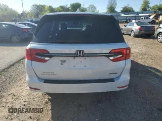 2021 Honda Odyssey Touring with VIN 5FNRL6H86MB003309, listed as a Copart auction lot 51648654 with 132,393 mi miles and Salvage Title. Bid and sale history available at carsss.com. Image 6.
