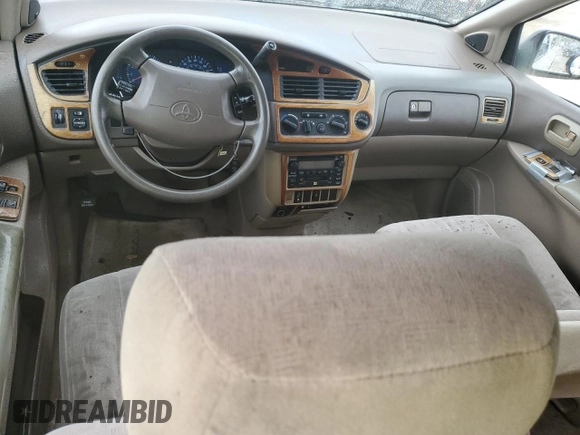 2001 Toyota Sienna LE with VIN 4T3ZF13C21U369506, listed as a Copart auction lot 74561634 with 0 mi miles and Salvage Title. Bid and sale history available at carsss.com. Image 8.