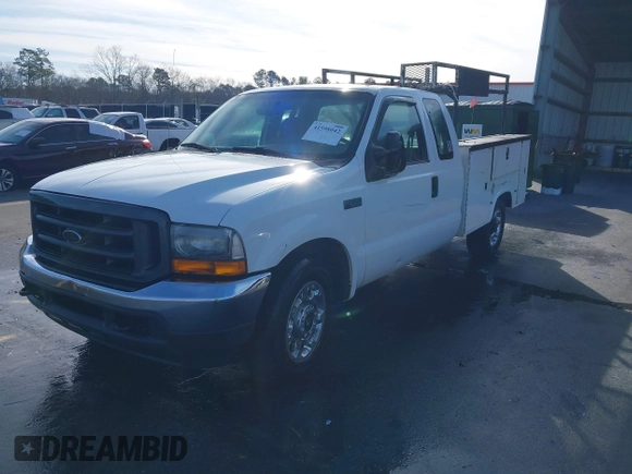 2004 Ford Super Duty F-250 XL with VIN 1FTNX20L44EC45528, listed as a IAAI auction lot 41598042 with 2,163,017 mi miles. Bid and sale history available at carsss.com. Image 2.