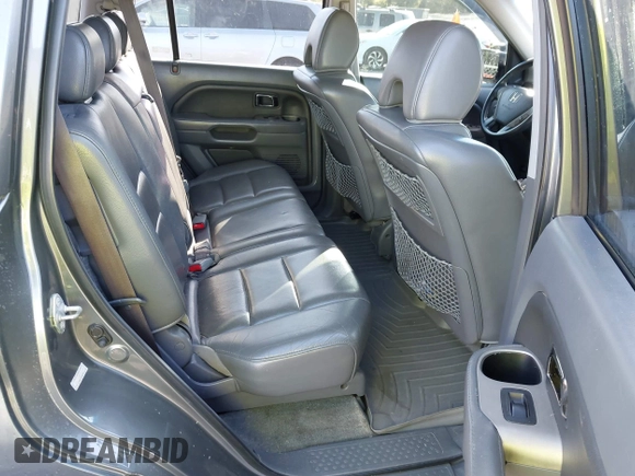 2007 Honda Pilot EX-L with VIN 2HKYF18727H528564, listed as a IAAI auction lot 42010708 with 260,364 mi miles and . Bid and sale history available at DreamBid. Image 8.