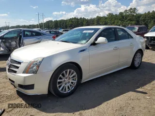 2010 Cadillac CTS Luxury with VIN 1G6DE5EG9A0132751, listed as a Copart auction lot 69049134 with 128,857 mi miles and Salvage Title. Bid and sale history available at carsss.com. Image 1.