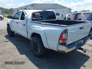 2015 Toyota Tacoma with VIN 3TMLU4EN1FM195626, listed as a IAAI auction lot 42571649 with 135,699 mi miles and . Bid and sale history available at DreamBid. Image 3.