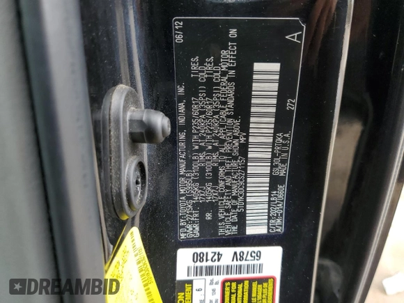 2012 Toyota Sienna XLE AAS z VIN 5TDYK3DC9CS271157, wystawiony jako Copart lot #55418065 z przebiegiem 172 988 mil mil oraz Nie do naprawy • Non repairable. Historia ofert i sprzedaży dostępna na DreamBid. Obrazek 13.