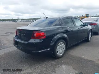 2013 Dodge Avenger SE with VIN 1C3CDZAB8DN725297, listed as a IAAI auction lot 40781847 with 142,049 mi miles. Bid and sale history available at carsss.com. Image 4.