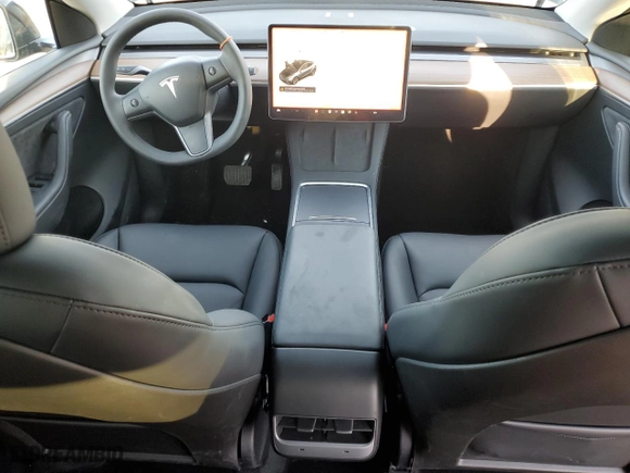 2024 Tesla Model Y with VIN 7SAYGDED7RF206693, listed as a Copart auction lot 43712515 with 5,550 mi miles and Salvage Title. Bid and sale history available at carsss.com. Image 8.