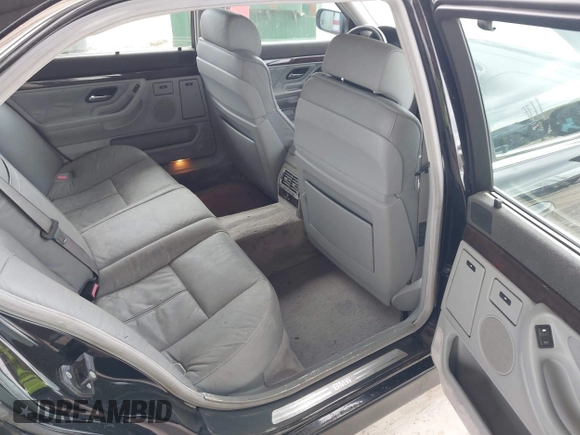 1997 BMW 7 Series 740il with VIN WBAGJ8324VDL43320, listed as a IAAI auction lot 41990660 with 193,998 mi miles. Bid and sale history available at carsss.com. Image 8.