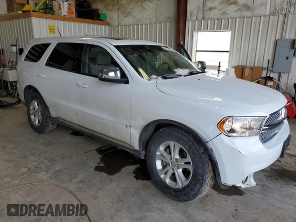 2013 Dodge Durango SXT with VIN 1C4RDJAG4DC564946, listed as a Copart auction lot 44162164 with 103,849 mi miles and Clean title. Bid and sale history available at DreamBid. Image 4.