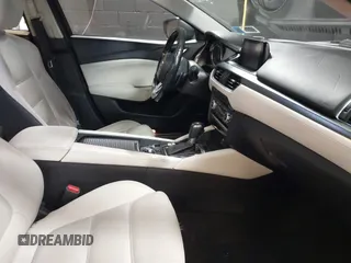 2017 Mazda 6 Grand Touring with VIN JM1GL1W51H1101519, listed as a IAAI auction lot 42132215 with 145,796 mi miles. Bid and sale history available at carsss.com. Image 5.
