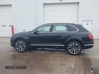 2019 Bentley Bentayga V8 z VIN SJAAM2ZVXKC025218, wystawiony jako IAAI lot #41741586 z przebiegiem 52 457 mil mil oraz . Historia ofert i sprzedaży dostępna na DreamBid. Obrazek 14.
