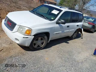 2004 GMC Envoy SLE with VIN 1GKDT13S442223832, listed as a IAAI auction lot 41845628 with 265,898 mi miles. Bid and sale history available at carsss.com. Image 18.