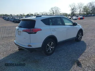 2018 Toyota RAV4 XLE with VIN 2T3WFREV2JW412970, listed as a IAAI auction lot 41986122 with 61,828 mi miles. Bid and sale history available at carsss.com. Image 4.