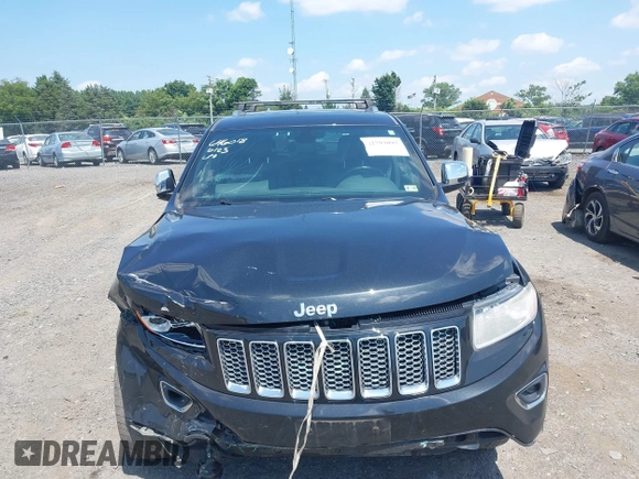 2014 Jeep Grand Cherokee Limited with VIN 1C4RJFBTXEC140898, listed as a IAAI auction lot 42793097 with 159,542 mi miles and . Bid and sale history available at DreamBid. Image 13.