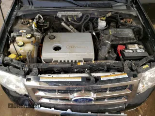 2010 Ford Escape Hybrid with VIN 1FMCU4K30AKC25228, listed as a Copart auction lot 60322835 with 207,629 mi miles and Salvage title. Bid and sale history available at DreamBid. Image 11.