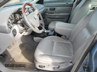 2005 Mercury Sable LS z VIN 1MEFM55S15A634567, wystawiony jako Copart lot #53136945 z przebiegiem 85 396 mil mil oraz Szkody całkowita. Historia ofert i sprzedaży dostępna na DreamBid. Obrazek 7.