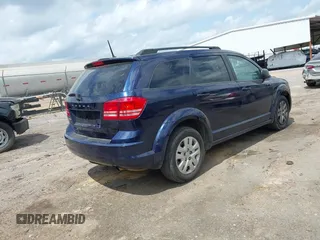 2018 Dodge Journey SE with VIN 3C4PDCAB7JT519491, listed as a IAAI auction lot 41974735 with 135,072 mi miles and . Bid and sale history available at DreamBid. Image 4.