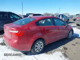 2014 Kia Rio LX with VIN KNADM4A3XE6408514, listed as a IAAI auction lot 41638709 with 97,231 mi miles. Bid and sale history available at carsss.com. Image 4.
