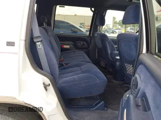1995 Chevrolet Tahoe with VIN 1GNEC13K9SJ414611, listed as a IAAI auction lot 42798752 with 205,988 mi miles and . Bid and sale history available at DreamBid. Image 8.