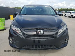 2018 Honda Odyssey EX-L z VIN 5FNRL6H7XJB031245, wystawiony jako Copart lot #59331635 z przebiegiem 74 901 mil mil oraz Czysty tytuł • Clean title. Historia ofert i sprzedaży dostępna na DreamBid. Obrazek 5.