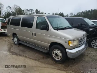 2001 Ford Econoline Passenger XL with VIN 1FBSS31LX1HA23564, listed as a Copart auction lot 77703044 with 276,538 mi miles and Salvage title. Bid and sale history available at DreamBid. Image 4.