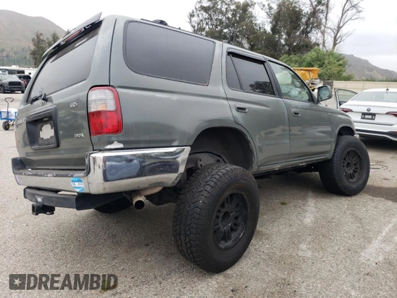 1999 Toyota 4Runner SR5 with VIN JT3GN86R4X0095939, listed as a Copart auction lot 60755965 with 276,622 mi miles and Salvage title. Bid and sale history available at DreamBid. Image 3.