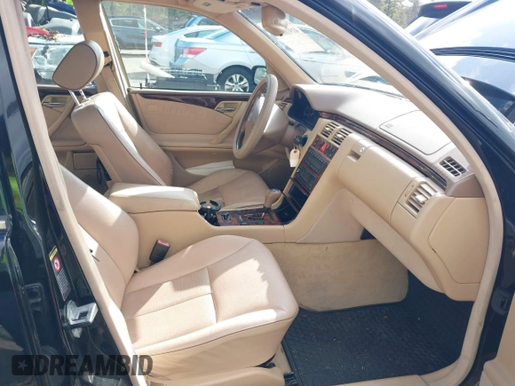 2000 Mercedes-Benz E-Class with VIN WDBJF82J2YX037818, listed as a IAAI auction lot 41910044 with 163,240 mi miles. Bid and sale history available at carsss.com. Image 5.
