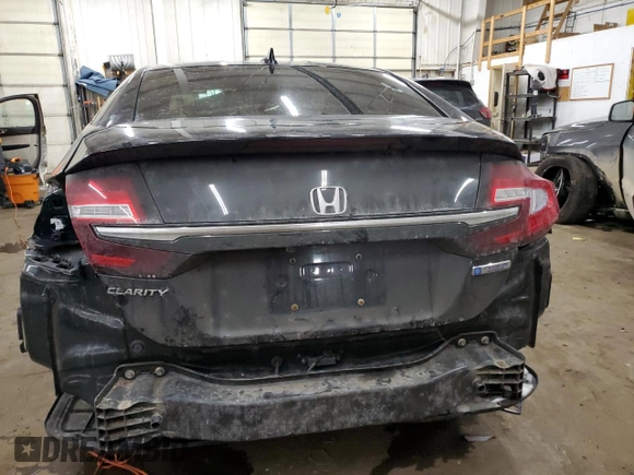 2018 Honda Clarity z VIN JHMZC5F13JC012248, wystawiony jako Copart lot #88791975 z przebiegiem 132 090 mil mil oraz Nie do naprawy • Non repairable. Historia ofert i sprzedaży dostępna na DreamBid. Obrazek 6.