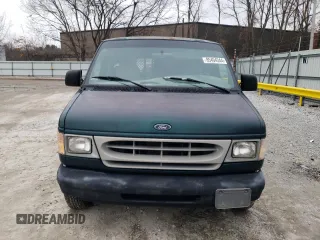 1999 Ford Econoline Cargo with VIN 1FTRE1424XHB64812, listed as a Copart auction lot 85494344 with 197,032 mi miles and Non Repairable. Bid and sale history available at carsss.com. Image 5.