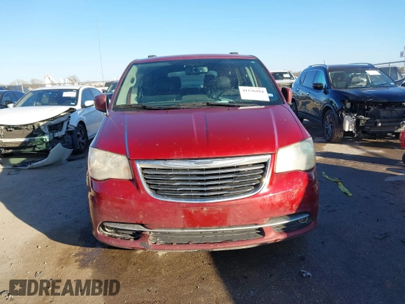 2013 Chrysler Town & Country Touring with VIN 2C4RC1BG2DR758951, listed as a IAAI auction lot 41136184 with 134,784 mi miles. Bid and sale history available at carsss.com. Image 12.