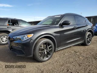 2019 Alfa Romeo Stelvio Ti Lusso z VIN ZASPAKBN5K7C44261, wystawiony jako Copart lot #81587994 z przebiegiem 72 220 mil mil oraz Szkoda całkowita • Salvage title. Historia ofert i sprzedaży dostępna na DreamBid. Obrazek 1.