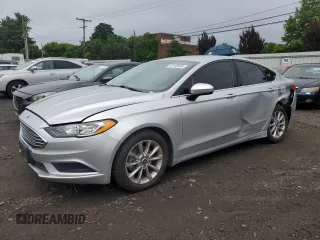 2017 Ford Fusion SE с VIN 3FA6P0H74HR183850, выставлен на аукционе Copart как лот 61140595 с пробегом 60 996 миль миль и Списание • Salvage title. История ставок и продаж доступна на DreamBid. Изображение 1.