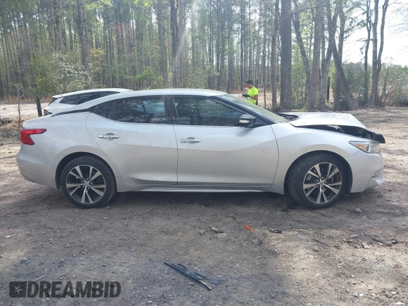 2016 Nissan Maxima SL with VIN 1N4AA6AP9GC406406, listed as a IAAI auction lot 41954790 with 139,380 mi miles and . Bid and sale history available at DreamBid. Image 13.