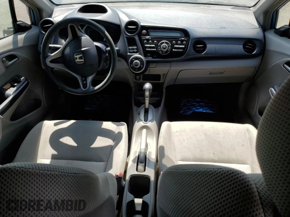 2010 Honda Insight LX with VIN JHMZE2H51AS028849, listed as a Copart auction lot 65547805 with 209,316 mi miles and Salvage title. Bid and sale history available at DreamBid. Image 8.