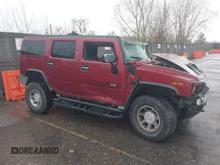 2003 Hummer H2 with VIN 5GRGN23U33H143085, listed as a IAAI auction lot 41949890 with 1 mi miles. Bid and sale history available at carsss.com. Image 1.