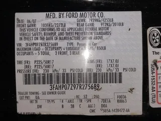 2007 Ford Fusion SE with VIN 3FAHP07Z97R275689, listed as a IAAI auction lot 42040917 with 183,886 mi miles. Bid and sale history available at carsss.com. Image 9.