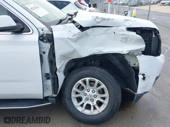 2019 GMC Yukon XL SLT with VIN 1GKS2GKC4KR160002, listed as a IAAI auction lot 42125427 with 119,312 mi miles and . Bid and sale history available at DreamBid. Image 6.