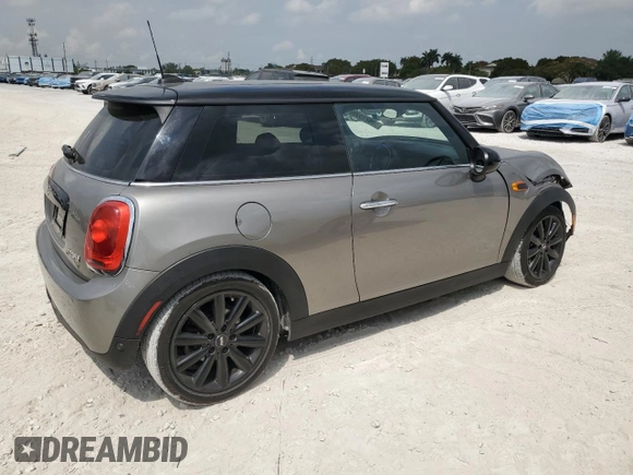 2018 MINI Hardtop Cooper with VIN WMWXP5C56J2H29012, listed as a Copart auction lot 50571595 with 77,129 mi miles and Salvage title. Bid and sale history available at DreamBid. Image 3.