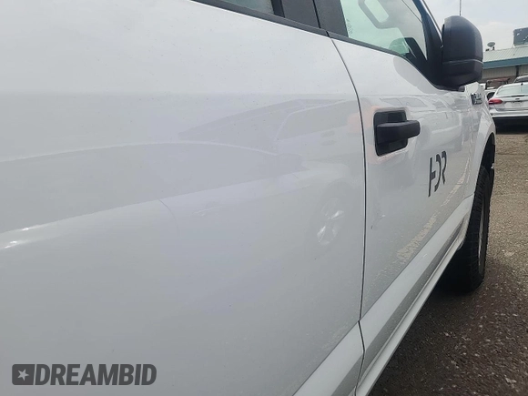 2017 Ford F-150 XL with VIN 1FTEX1E82HKD27618, listed as a IAAI auction lot 42796140 with 124,457 mi miles and . Bid and sale history available at DreamBid. Image 27.