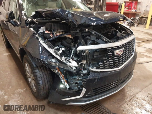 2021 Cadillac XT5 AWD Premium Luxury with VIN 1GYKNDR41MZ156521, listed as a IAAI auction lot 41554791 with 30,871 mi miles and . Bid and sale history available at DreamBid. Image 6.