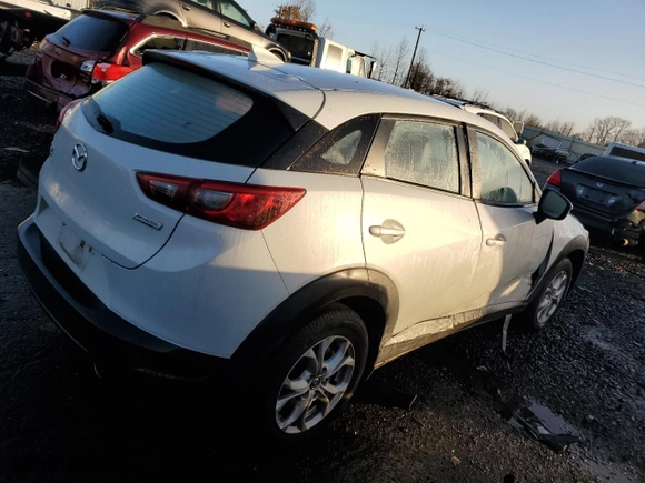 2016 Mazda CX-3 Touring with VIN JM1DKBC7XG0110631, listed as a Copart auction lot 82221324 with 20,922 mi miles and Salvage Title. Bid and sale history available at carsss.com. Image 3.