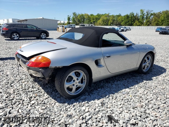 1998 Porsche Boxster z VIN WP0CA298XWU622217, wystawiony jako Copart lot #49441925 z przebiegiem 120 638 mil mil oraz Szkoda całkowita • Salvage title. Historia ofert i sprzedaży dostępna na DreamBid. Obrazek 3.