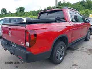 2023 Honda Ridgeline RTL with VIN 5FPYK3F53PB059323, listed as a IAAI auction lot 42485621 with Not provided miles and . Bid and sale history available at DreamBid. Image 4.