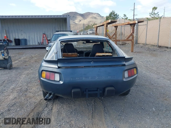1982 Porsche 928 z VIN WP0JA0926CS821506, wystawiony jako IAAI lot #41903954 z przebiegiem 64 814 mil mil oraz . Historia ofert i sprzedaży dostępna na DreamBid. Obrazek 16.