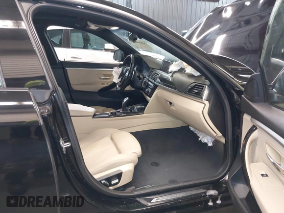 2018 BMW 4 Series 430i xDrive with VIN WBA4J3C56JBL03844, listed as a IAAI auction lot 40864200 with 56,115 mi miles and . Bid and sale history available at DreamBid. Image 5.