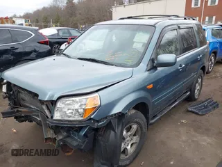 2006 Honda Pilot EX with VIN 5FNYF28436B013517, listed as a IAAI auction lot 41607406 with 235,561 mi miles and . Bid and sale history available at DreamBid. Image 2.