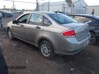 2008 Ford Focus SE with VIN 1FAHP35N98W165970, listed as a IAAI auction lot 42028598 with 242,004 mi miles and . Bid and sale history available at carsss.com. Image 3.