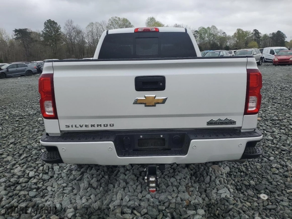 2017 Chevrolet Silverado 1500 High Country with VIN 3GCUKTEJ6HG124280, listed as a Copart auction lot 51486285 with 132,268 mi miles and Salvage Title. Bid and sale history available at carsss.com. Image 6.